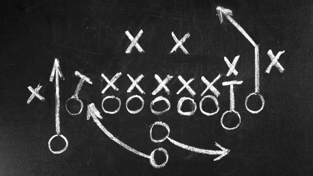 Tactics: Xs and Os on a chalkboard