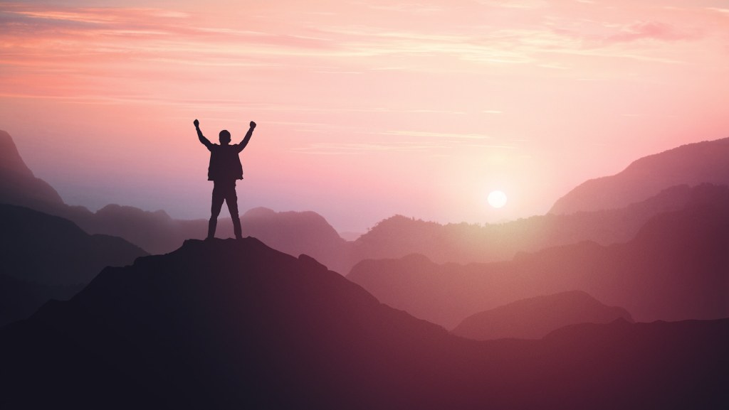 Man Achieving Life Goals